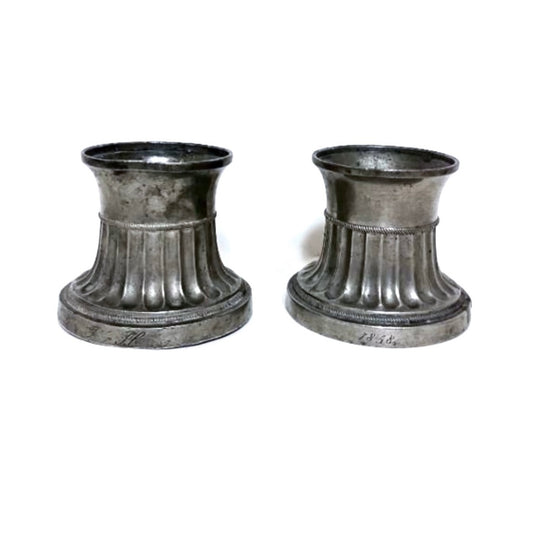 A pair of pewter candlesticks, year 1858